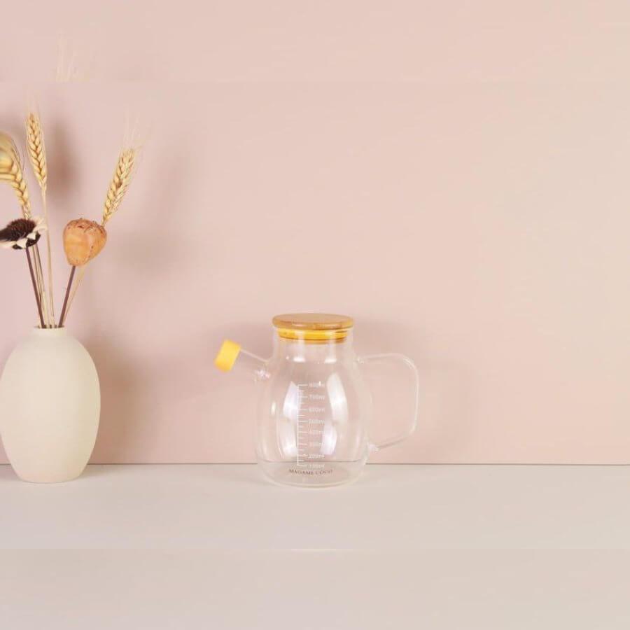 روغنریز تپل شیشهای با درب بامبو روغنریز تپل ۵۰۰ میلیلیتری با درب چوب بامبو • توضیح مختصر: روغنریز تپل شیشهای ۵۰۰ میلیلیتری با درب چوب بامبو مناسب آشپزخانه مدرن