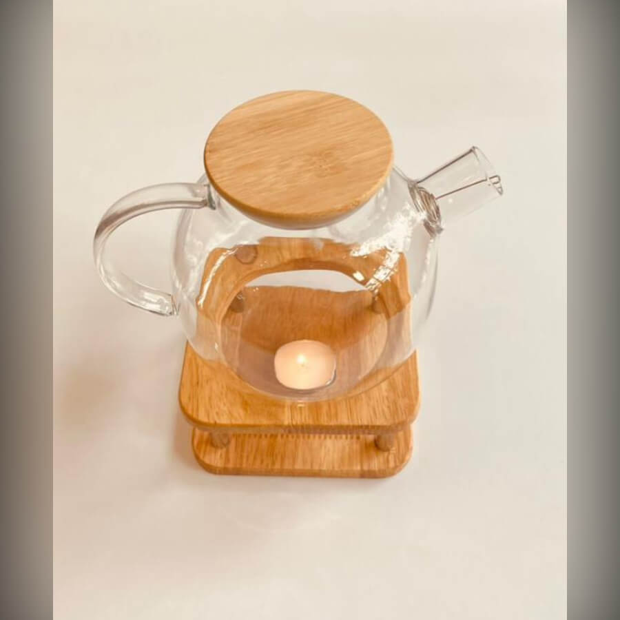 قوری پیرکس با درب چوبی و وارمر چوبی قوری پیرکس ۱ لیتری همراه وارمر چوبی